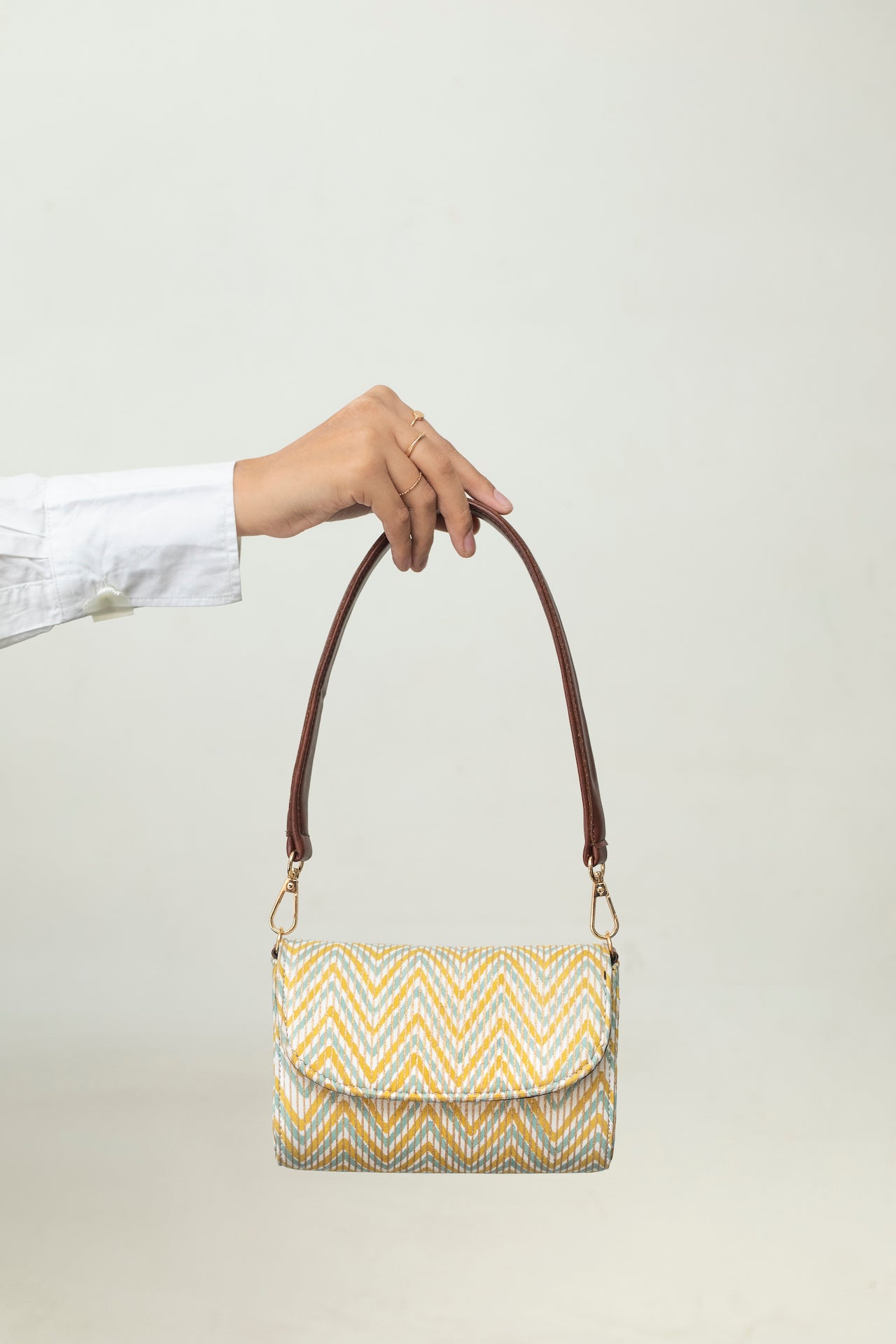 MEDALLION SHOULDER BAG