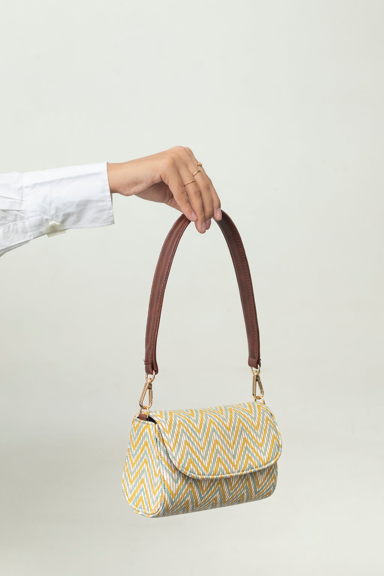 MEDALLION SHOULDER BAG